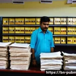 공공관리사 업무 중 자주 겪는 문제 - **Prompt:** A bustling government office in a South Asian city, specifically in a Bengali context. T...